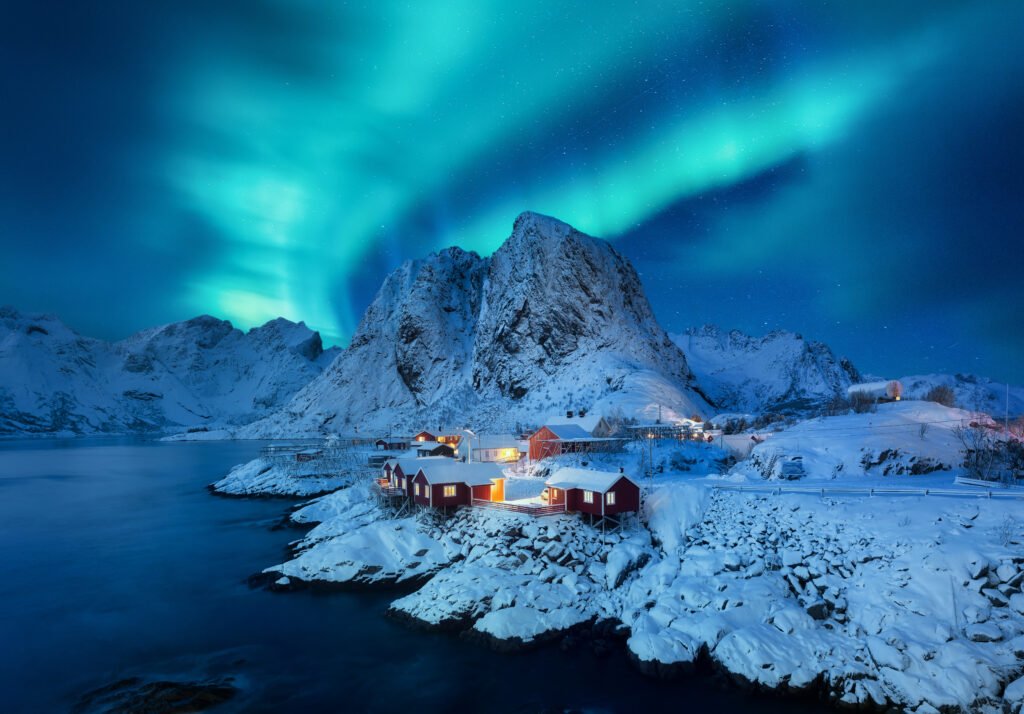 2025 Mid-Autumn Festival aurora borealis, lofoten islands, norway. view on the houses in the hamnoy village, lofoten islands, norway. iconic view in norway. high resolution photo.